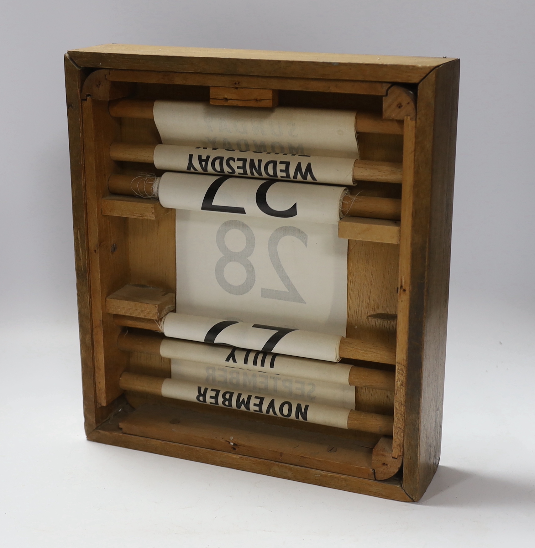 A 20th century wall hanging calendar, 33cm high